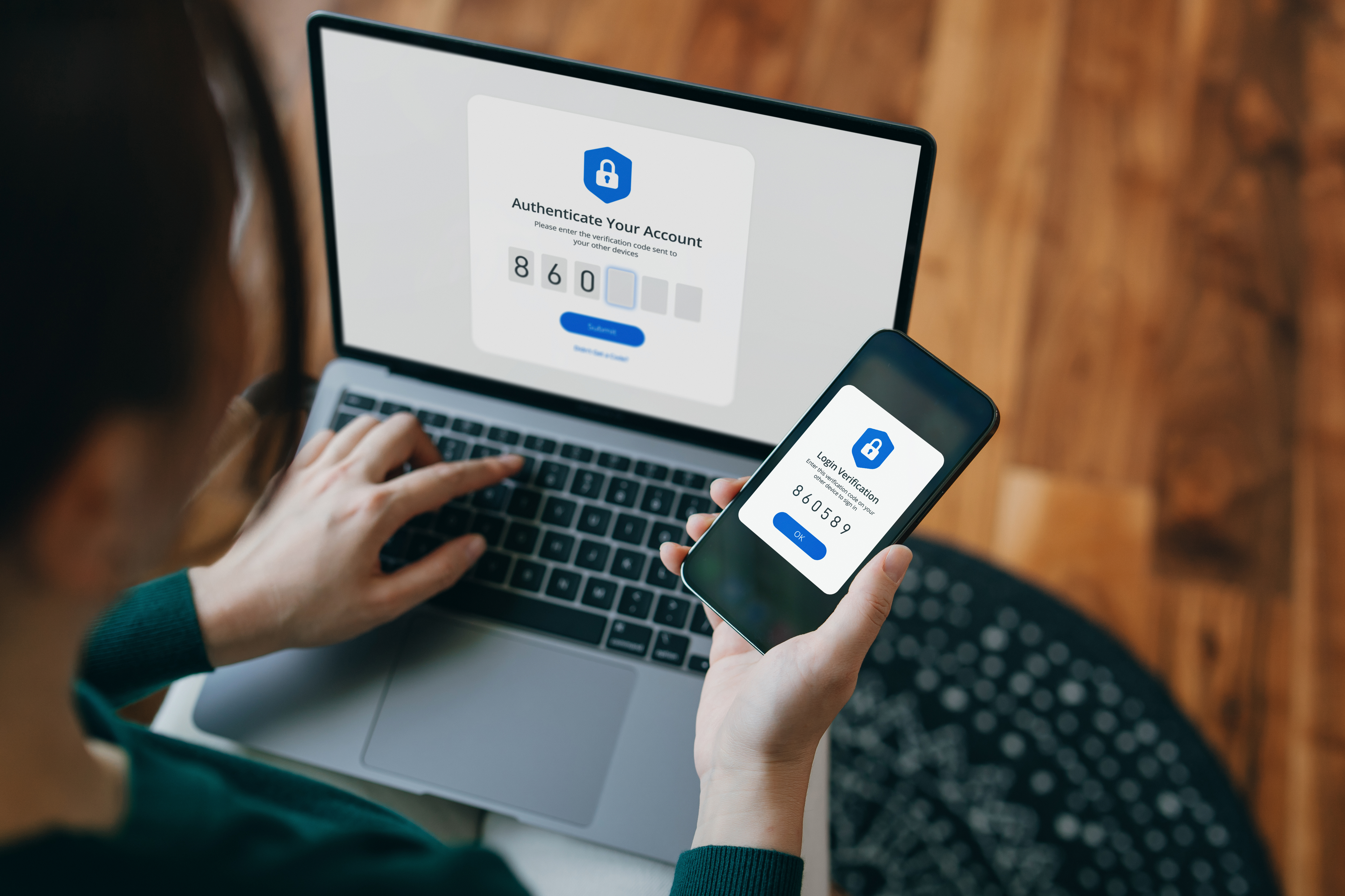 A woman typing in an authentication code