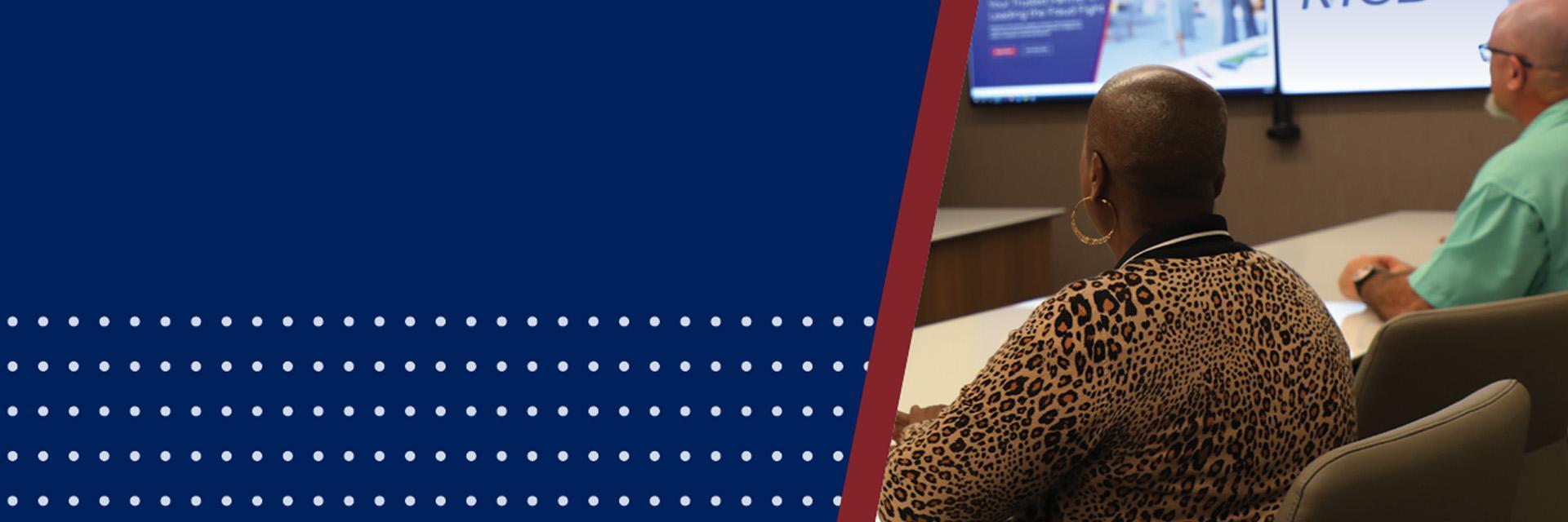 NICB employees sitting at a table